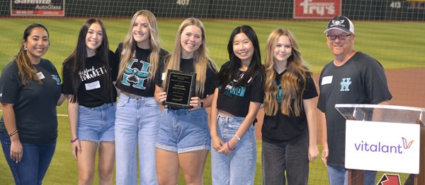 Highland High School winners receiving award on baseball field