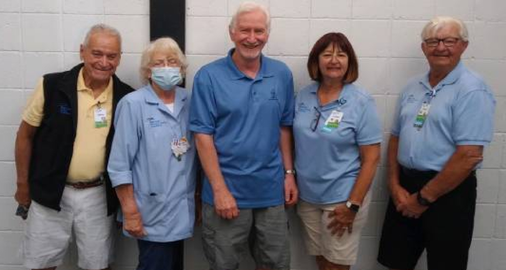 Larry Coffman with group of hospital staff